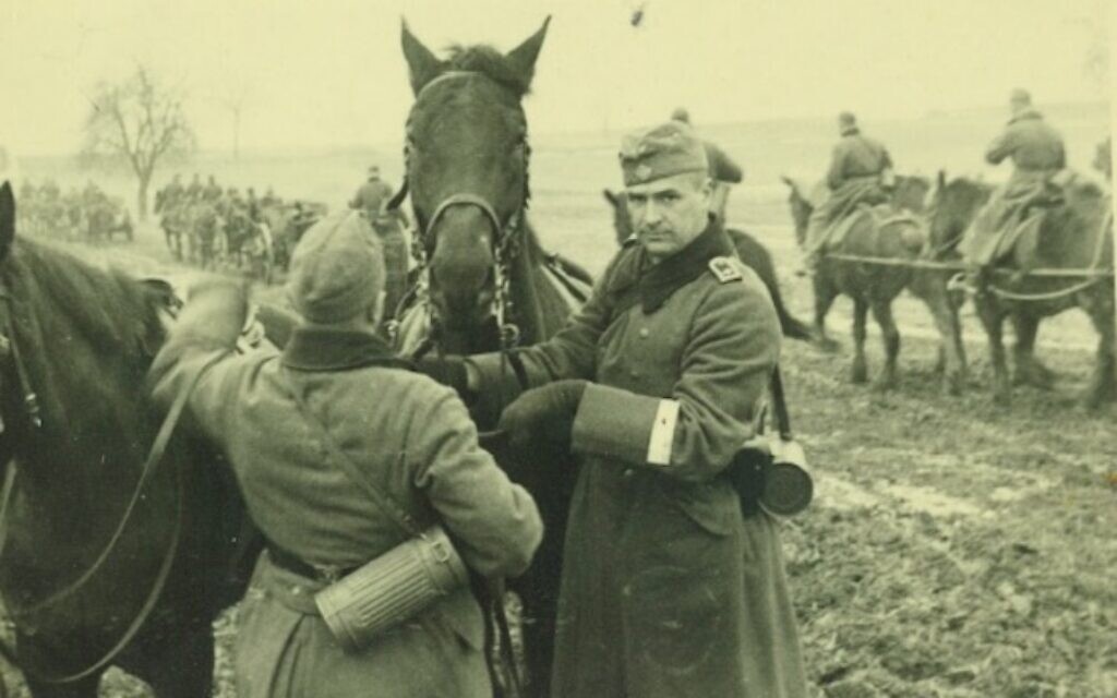 Robert Griesinger (right) in Wehrmacht uniform with one of the horses from the 25th Infantry Division c. 1939 (Courtesy of Jutta Mangold)