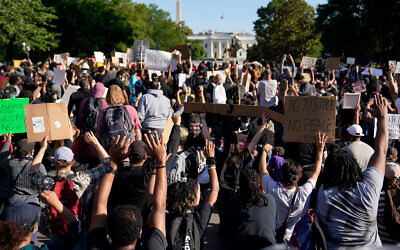 Demonstrators gather to protest the death of George Floyd, near the White House in Washington, June 1, 2020. (AP/Evan Vucci)