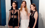The Haim sisters, from left, Danielle, Este and Alana, at the Vanity Fair Oscar Party in Beverly Hills, California, February 9, 2020. (Taylor Hill/FilmMagic/Getty Images via JTA)
