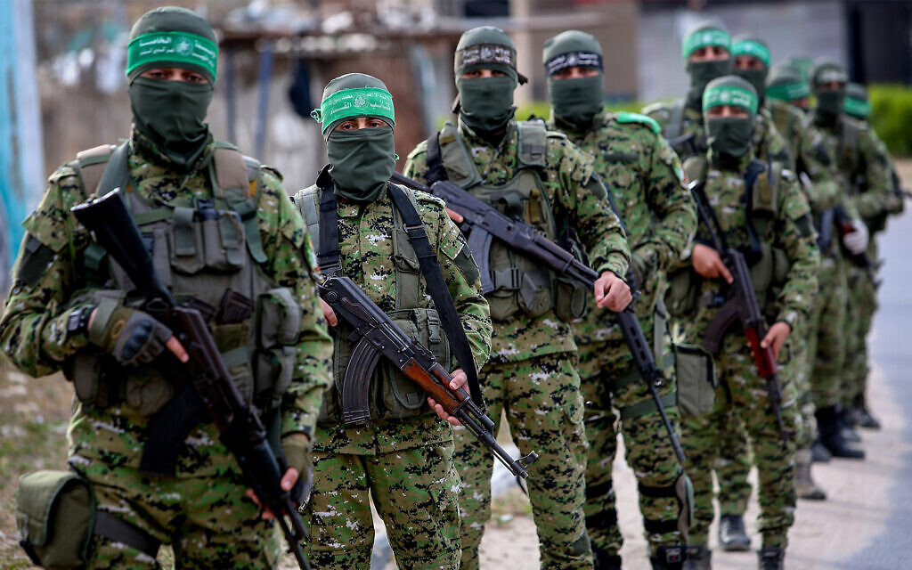 Illustrative: Palestinian members of the Izz ad-Din al-Qassam Brigades, the armed wing of the Hamas terrorist movement, during a patrol in Rafah, in the southern Gaza Strip on April 27, 2020. (Abed Rahim Khatib/Flash90)