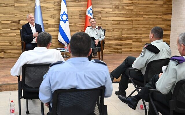 Defense Minister Benny Gantz, left, and IDF Chief of Staff Aviv Kohavi, right, meet with the IDF General Staff in the military's Kirya headquarters in Tel Aviv on May 18, 2020. (Ariel Hermoni/ Defense Ministry) Defense Minister Benny Gantz, left, and IDF Chief of Staff Aviv Kohavi, right, meet with the IDF General Staff in the military's Kirya headquarters in Tel Aviv on May 18, 2020. (Ariel Hermoni/ Defense Ministry)