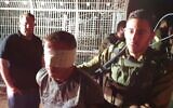 IDF soldiers detain a Palestinian caught trying to infiltrate Itamar settlement with a knife on June 9, 2020. (Roy Hadi/Samaria Regional Council)