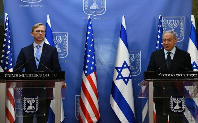 Prime Minister Benjamin Netanyahu, right, meets with US Special Representative for Iran Brian Hook in Jerusalem on June 30, 2020. (Haim Tzach/GPO)