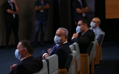 Prime Minister Benjamin Netanyahu (center) attends a ceremony welcoming the new Health Ministry director general, in Jerusalem on June 18, 2020 (Health Ministry)