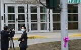 Members of the media wearing protective mask film outside the Young Israel of New Rochelle synagogue, New York on March 10, 2020, at the center of a Westchester County outbreak (TIMOTHY A. CLARY/AFP via Getty Images)