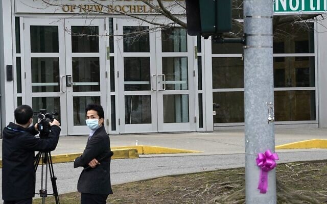 Members of the media wearing protective mask film outside the Young Israel of New Rochelle synagogue, New York on March 10, 2020, at the center of a Westchester County outbreak (TIMOTHY A. CLARY/AFP via Getty Images) Members of the media wearing protective mask film outside the Young Israel of New Rochelle synagogue, New York on March 10, 2020, at the center of a Westchester County outbreak (TIMOTHY A. CLARY/AFP via Getty Images)