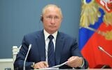 Russian President Vladimir Putin attends a video conference a trilateral meeting with the leaders of Iran and Turkey on the topic of Syria, in Moscow on July 1, 2020. (Alexey Druzhinin/Sputnik/AFP)