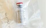 A vial of remdesivir is pictured during a press conference about the start of a study with the anti-viral drug at the University Hospital Eppendorf (UKE) in Hamburg, Germany, April 8, 2020. (Ulrich Perrey / POOL / AFP)