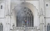 Firefighters work to put out a fire at the Saint-Pierre-et-Saint-Paul cathedral in Nantes, western France, on July 18, 2020.  (Sebastien SALOM-GOMIS / AFP)