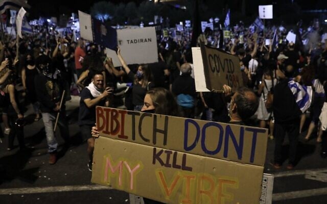 Israelis protest against Prime Minister Benjamin Netanyahu in Jerusalem, on July 21, 2020. (Photo by Ahmad GHARABLI / AFP)