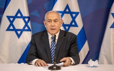 Prime Minister Benjamin Netanyahu gives a televised statement at the Defense Ministry in Tel Aviv on July 27, 2020. (Tal Shahar/Pool/AFP)