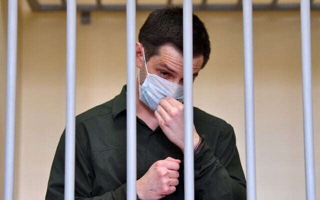 US ex-marine Trevor Reed, charged with attacking police, stands inside a defendants' cage during his verdict hearing at Moscow's Golovinsky district court on July 30, 2020. (Dimitar DILKOFF / AFP) US ex-marine Trevor Reed, charged with attacking police, stands inside a defendants' cage during his verdict hearing at Moscow's Golovinsky district court on July 30, 2020. (Dimitar DILKOFF / AFP)