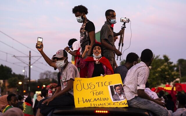 Demonstrators march down University Avenue during a protest after the death of musician and activist Hachalu Hundessa on the westbound lane of Interstate 94 on July 1, 2020 in St Paul, Minnesota. (Stephen Maturen/Getty Images/AFP) Demonstrators march down University Avenue during a protest after the death of musician and activist Hachalu Hundessa on the westbound lane of Interstate 94 on July 1, 2020 in St Paul, Minnesota. (Stephen Maturen/Getty Images/AFP)