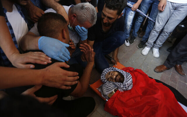 Mourners at the funeral of Ibrahim Abu Yaqoub, 29, who was shot in unclear circumstances in the West Bank, on July 10, 2020 (WAFA) Mourners at the funeral of Ibrahim Abu Yaqoub, 29, who was shot in unclear circumstances in the West Bank, on July 10, 2020 (WAFA)
