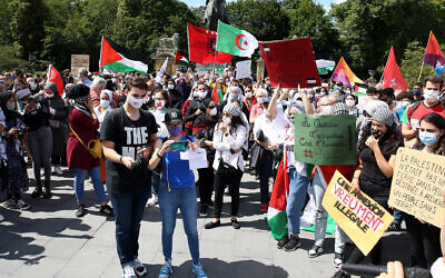 Protesters demonstrate against Israel's plan to annex parts of the West Bank during a rally in Brussels, Belgium, on June 28, 2020. (Dursun Aydemir/Anadolu Agency via Getty Images via JTA)