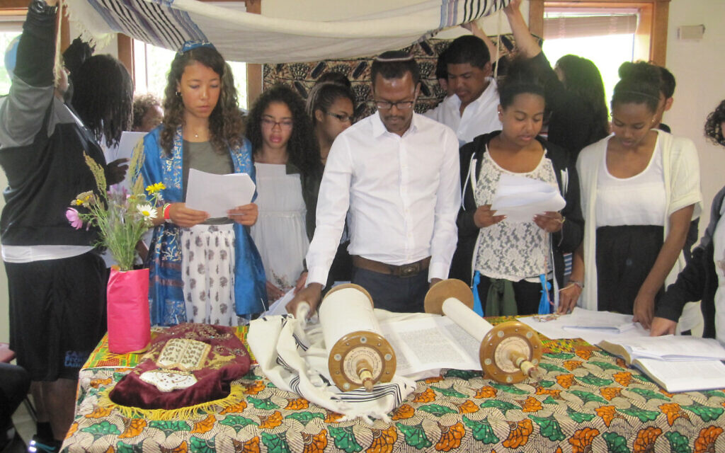A Shabbat service at Camp Be’chol Lashon in 2016 led by Ethiopian Israeli, Maor Sanbata and campers. (Courtesy of Be’chon Lashon/ via JTA)