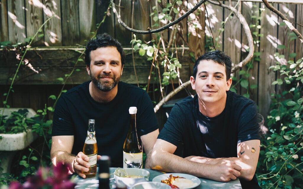 Amir Nathan, left, and Jordan Anderson have adapted their menu for the era of COVID-19. (Briana Balduci/ via JTA)