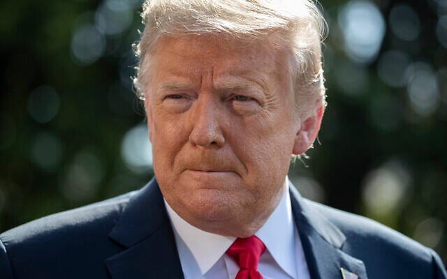 US President Donald Trump speaks with reporters before departing on Marine One on the South Lawn of the White House, Tuesday, June 23, 2020, in Washington. (AP Photo/Alex Brandon) US President Donald Trump speaks with reporters before departing on Marine One on the South Lawn of the White House, Tuesday, June 23, 2020, in Washington. (AP Photo/Alex Brandon)