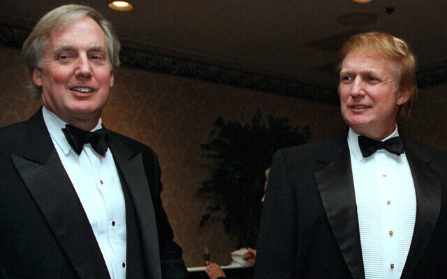 In this Nov. 3, 1999 file photo, Robert Trump, left, joins real estate developer and presidential hopeful Donald Trump at an event in New York.  (AP Photo/Diane Bonadreff, File)