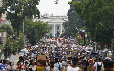 Demonstrators against racism gather near the White House in Washington, June 6, 2020. (Jacquelyn Martin/AP) Demonstrators against racism gather near the White House in Washington, June 6, 2020. (Jacquelyn Martin/AP)