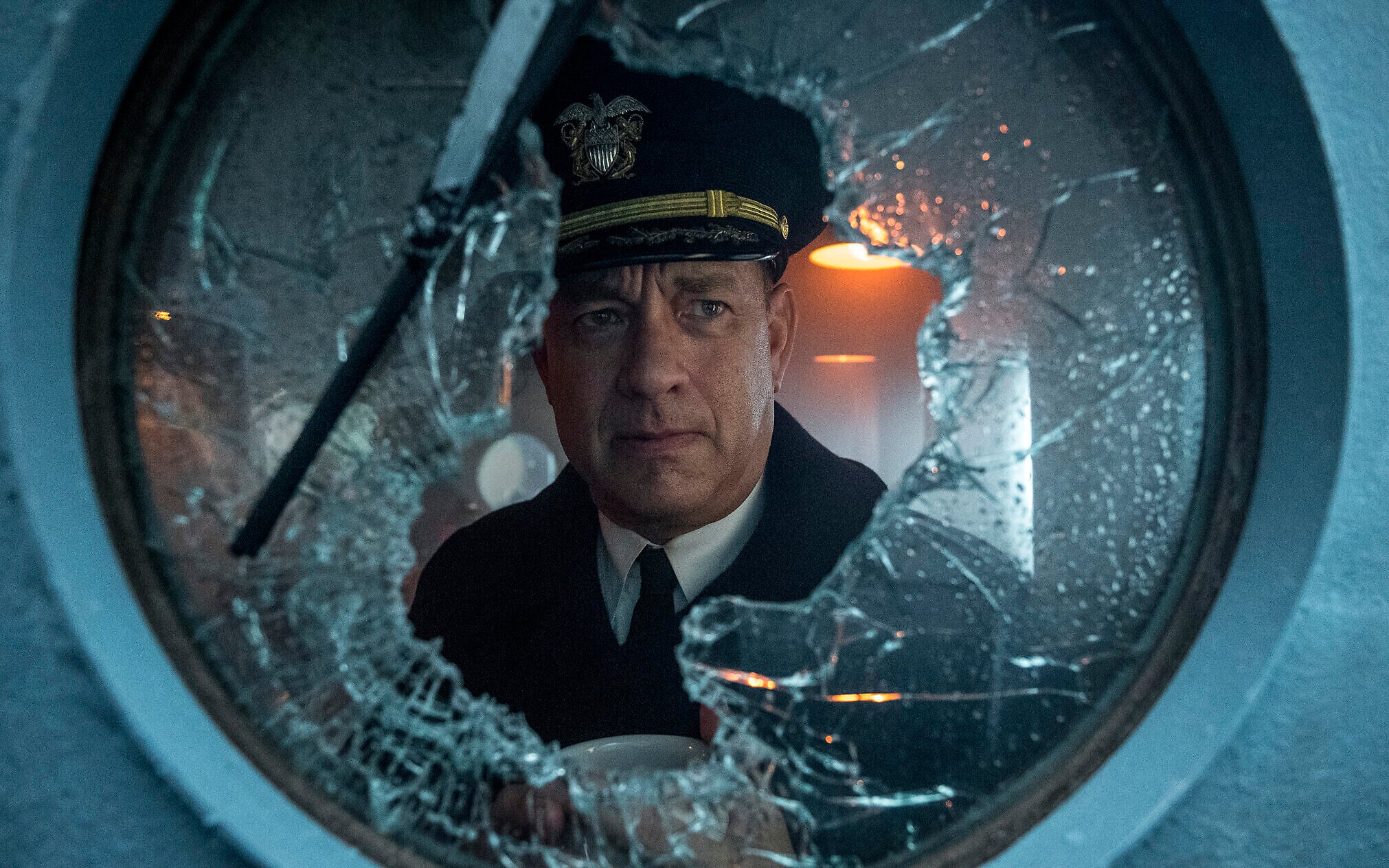 This image released by Apple TV Plus shows Tom Hanks in a scene from "Greyhound." (Apple TV + via AP) This image released by Apple TV Plus shows Tom Hanks in a scene from "Greyhound." (Apple TV + via AP)