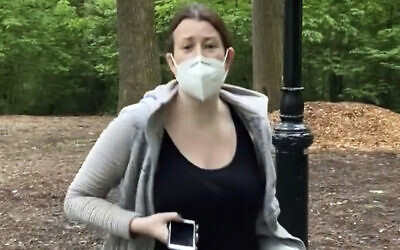 A screenshot from video of Amy Cooper with her dog talking to Christian Cooper in Central Park in New York, May 25, 2020. (Christian Cooper via AP, File)