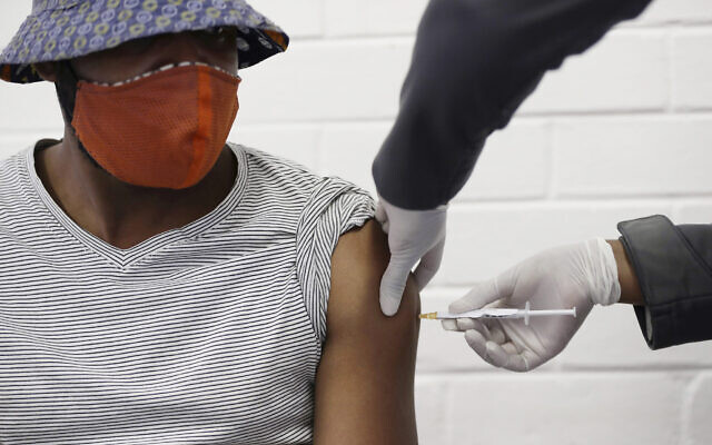 A volunteer receives a COVID-19 test vaccine injection developed at the University of Oxford in Britain, at the Chris Hani Baragwanath hospital in Soweto, Johannesburg, June 24, 2020. (Siphiwe Sibeko/AP) A volunteer receives a COVID-19 test vaccine injection developed at the University of Oxford in Britain, at the Chris Hani Baragwanath hospital in Soweto, Johannesburg, June 24, 2020. (Siphiwe Sibeko/AP)