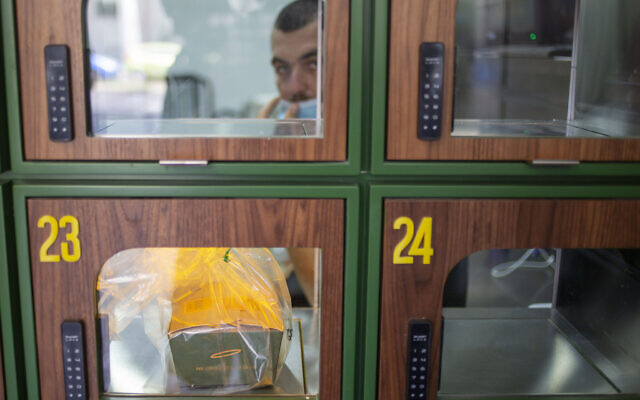 A ready to take away Go Noodles box is placed in a glass-paned locker in Tel Aviv, on July 16, 2020. (Ariel Schalit/AP) A ready to take away Go Noodles box is placed in a glass-paned locker in Tel Aviv, on July 16, 2020. (Ariel Schalit/AP)
