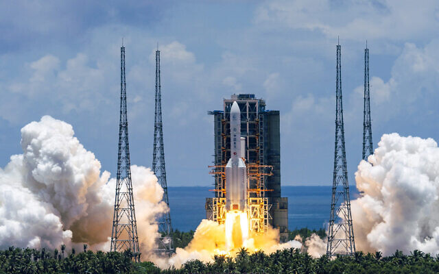 In this photo released by China's Xinhua News Agency, a Long March-5 rocket carrying the Tianwen-1 Mars probe lifts off from the Wenchang Space Launch Center in southern China's Hainan Province on July 23, 2020. (Cai Yang/Xinhua via AP) In this photo released by China's Xinhua News Agency, a Long March-5 rocket carrying the Tianwen-1 Mars probe lifts off from the Wenchang Space Launch Center in southern China's Hainan Province on July 23, 2020. (Cai Yang/Xinhua via AP)