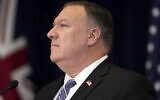 Secretary of State Mike Pompeo listens during a news conference at the State Department on July 28, 2020, in Washington. (Brendan Smialowski/Pool via AP)