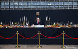 An installation depicting Prime Minister Benjamin Netanyahu at a mock 'Last Supper' by Israeli artist Itay Zalait, is placed at Rabin Square in Tel Aviv, July 29, 2020. (Oded Balilty/AP)