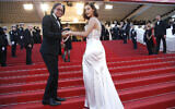 Mohamed Hadid, left, and Bella Hadid pose for photographers upon arrival at the opening ceremony and the screening of the film Ismael's Ghosts at the 70th international film festival, Cannes, southern France, May 17, 2017. (AP Photo/Thibault Camus)