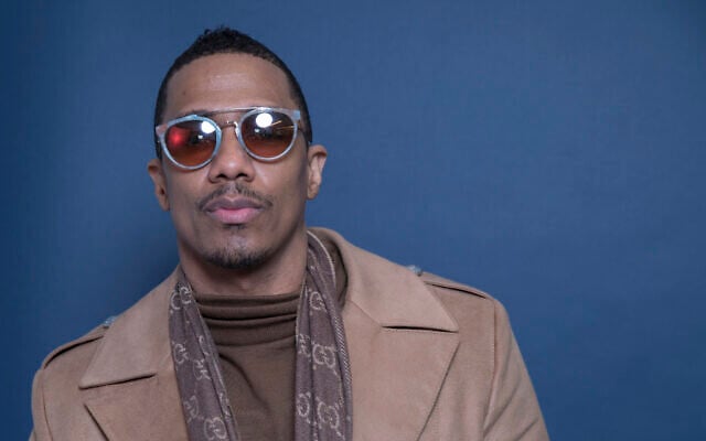 In this Dec. 10, 2018 photo, Nick Cannon poses for a portrait in New York to promote promoting his new show, "The Masked Singer." (Amy Sussman/Invision/AP) In this Dec. 10, 2018 photo, Nick Cannon poses for a portrait in New York to promote promoting his new show, "The Masked Singer." (Amy Sussman/Invision/AP)