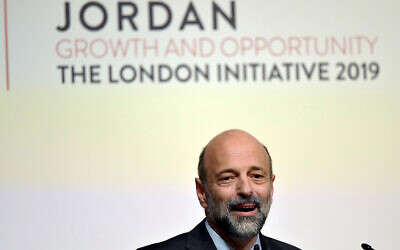 Jordanian Prime Minister Omar Razzaz speaks at the Jordan Growth and Opportunity Conference in London, February 28, 2019. (Toby Melville/PA via AP)