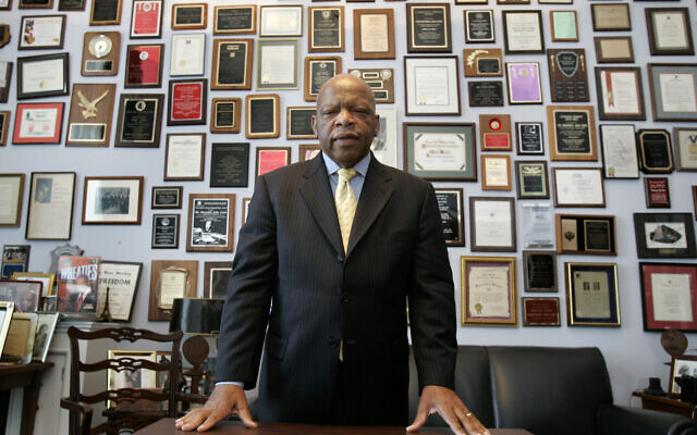 In this May 10, 2007 file photo, US Rep. John Lewis in his office on Capitol Hill, in Washington (AP Photo/Susan Walsh, File) In this May 10, 2007 file photo, US Rep. John Lewis in his office on Capitol Hill, in Washington (AP Photo/Susan Walsh, File)