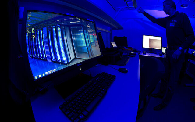 This Jan. 11, 2013 file photo of a staff member as he turns on the light in a lab at the Cybercrime Center at Europol headquarters in The Hague, Netherlands (AP Photo/Peter Dejong, File) This Jan. 11, 2013 file photo of a staff member as he turns on the light in a lab at the Cybercrime Center at Europol headquarters in The Hague, Netherlands (AP Photo/Peter Dejong, File)