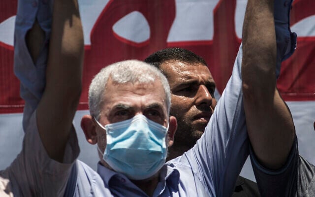 Palestinian Hamas leader in the Gaza Strip, Yahya Sinwar, attends a demonstration against Israeli plans for the annexation of parts of the West Bank, in Gaza City, Wednesday, July 1, 2020. (AP Photo/Khalil Hamra) Palestinian Hamas leader in the Gaza Strip, Yahya Sinwar, attends a demonstration against Israeli plans for the annexation of parts of the West Bank, in Gaza City, Wednesday, July 1, 2020. (AP Photo/Khalil Hamra)