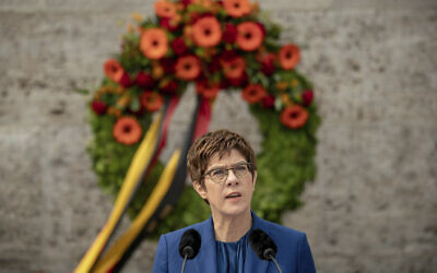 Annegret Kramp-Karrenbauer, German Minister of Defense, delivers her speech at the Ploetzense Lake Memorial in memory of those murdered in the resistance against the Nazis in Berlin, Germany, Monday, July 20, 2020. The day commemorates the failed assassination attempt on Adolf Hitler on July 20, 1944. (Michael Kappeler/dpa via AP)