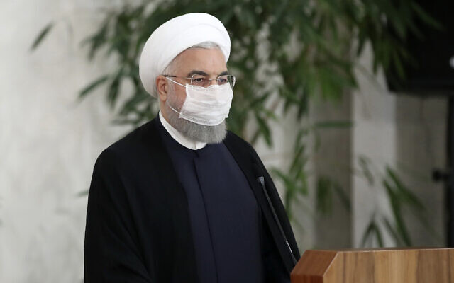 Iranian President Hassan Rouhani wears a protective face mask to help prevent spread of the coronavirus as he gives a press briefing in Tehran, Iran, July 21, 2020. (Iranian Presidency Office via AP) Iranian President Hassan Rouhani wears a protective face mask to help prevent spread of the coronavirus as he gives a press briefing in Tehran, Iran, July 21, 2020. (Iranian Presidency Office via AP)