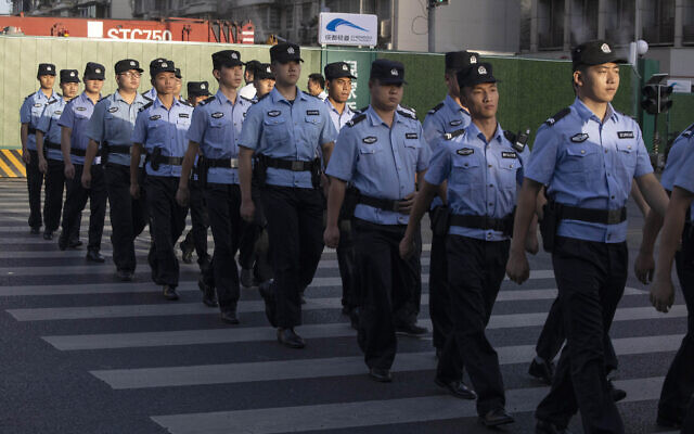 Chinese policemen prepare for duty around a neighborhood sealed off before the official closure of the United States Consulate in Chengdu in southwest China's Sichuan province, July 27, 2020 (AP Photo/Ng Han Guan) Chinese policemen prepare for duty around a neighborhood sealed off before the official closure of the United States Consulate in Chengdu in southwest China's Sichuan province, July 27, 2020 (AP Photo/Ng Han Guan)