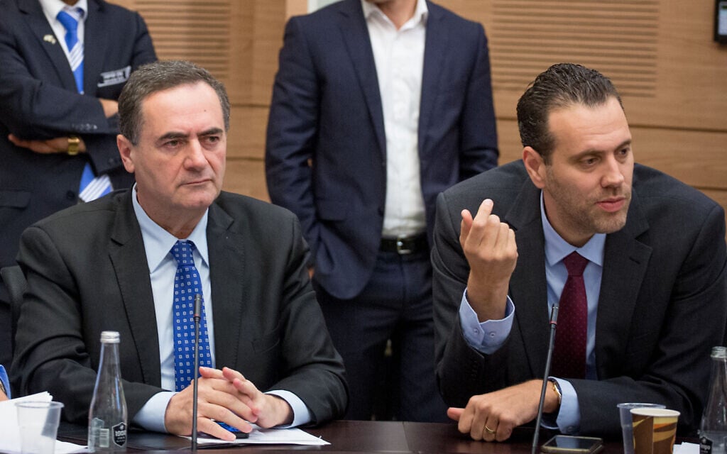 Then-transportation minister Israel Katz, left, and MK Miki Zohar at a Knesset committee meeting, March 23, 2016. (Yonatan Sindel/Flash90/File) Then-transportation minister Israel Katz, left, and MK Miki Zohar at a Knesset committee meeting, March 23, 2016. (Yonatan Sindel/Flash90/File)