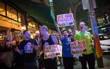 Members of the LGBT community and supporters participate in a protest against a Knesset bill amendment denying surrogacy for same-sex couples, in Tel Aviv on November 1, 2018, 2018. (Miriam Alster/Flash90)