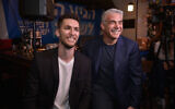 Yesh Atid party chairman Yair Lapid seen Idan Roll at a press conference in Tel Aviv, on February 7, 2019 (Flash90)