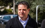 Joint List leader Ayman Odeh speaks to reporters outside his home in Haifa, on March 3, 2020. (Flash90)