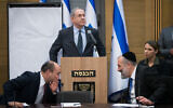 Prime Minister Benjamin Netanyahu speaks as then-defense minister Naftali Bennett and Interior Minister Aryeh Deri confer, during a meeting of right-wing party leaders at the Knesset following election day, on March 4, 2020. (Yonatan Sindel/Flash90)