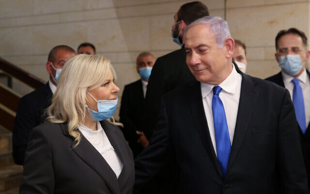 Prime Minister Benjamin Netanyahu and his wife Sara at the swearing in ceremony of the 23rd government in the Knesset on May 17, 2020. (Alex Kolomoisky/Flash90) Prime Minister Benjamin Netanyahu and his wife Sara at the swearing in ceremony of the 23rd government in the Knesset on May 17, 2020. (Alex Kolomoisky/Flash90)