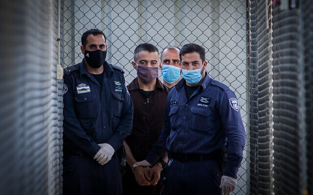 Shaban Titi is brought to the courtroom for his sentence at the Ofer military court near the West Bank city of Ramallah on July 6, 2020. (Flash90) Shaban Titi is brought to the courtroom for his sentence at the Ofer military court near the West Bank city of Ramallah on July 6, 2020. (Flash90)