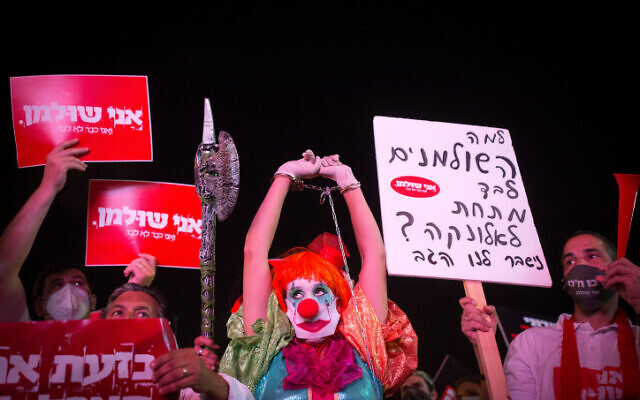Israelis protest for financial aid at Rabin Square in Tel Aviv on July 11, 2020. (Miriam Alster/Flash90) Israelis protest for financial aid at Rabin Square in Tel Aviv on July 11, 2020. (Miriam Alster/Flash90)