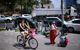 People in downtown Tel Aviv on July 13, 2020. (Tomer Neuberg/Flash90)
