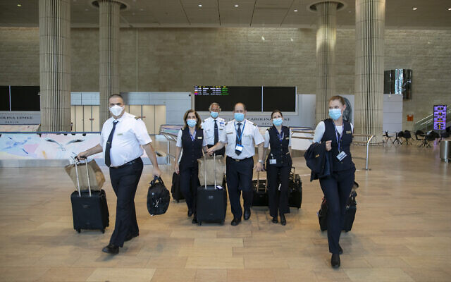 An El Al crew arrives at Ben Gurion airport on June 12, 2020. (Olivier Fitoussi/Flash90)